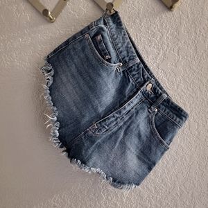 Medium wash blue BDG (urban outfitters) cheeky high rise shorts. Size 27w